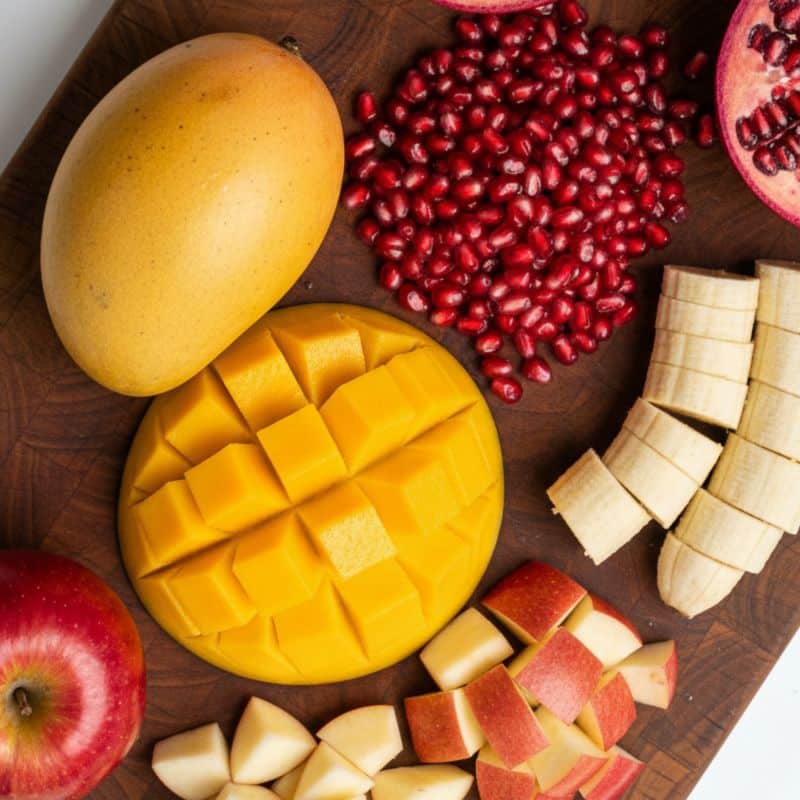 Cut the fruits into bite-sized pieces